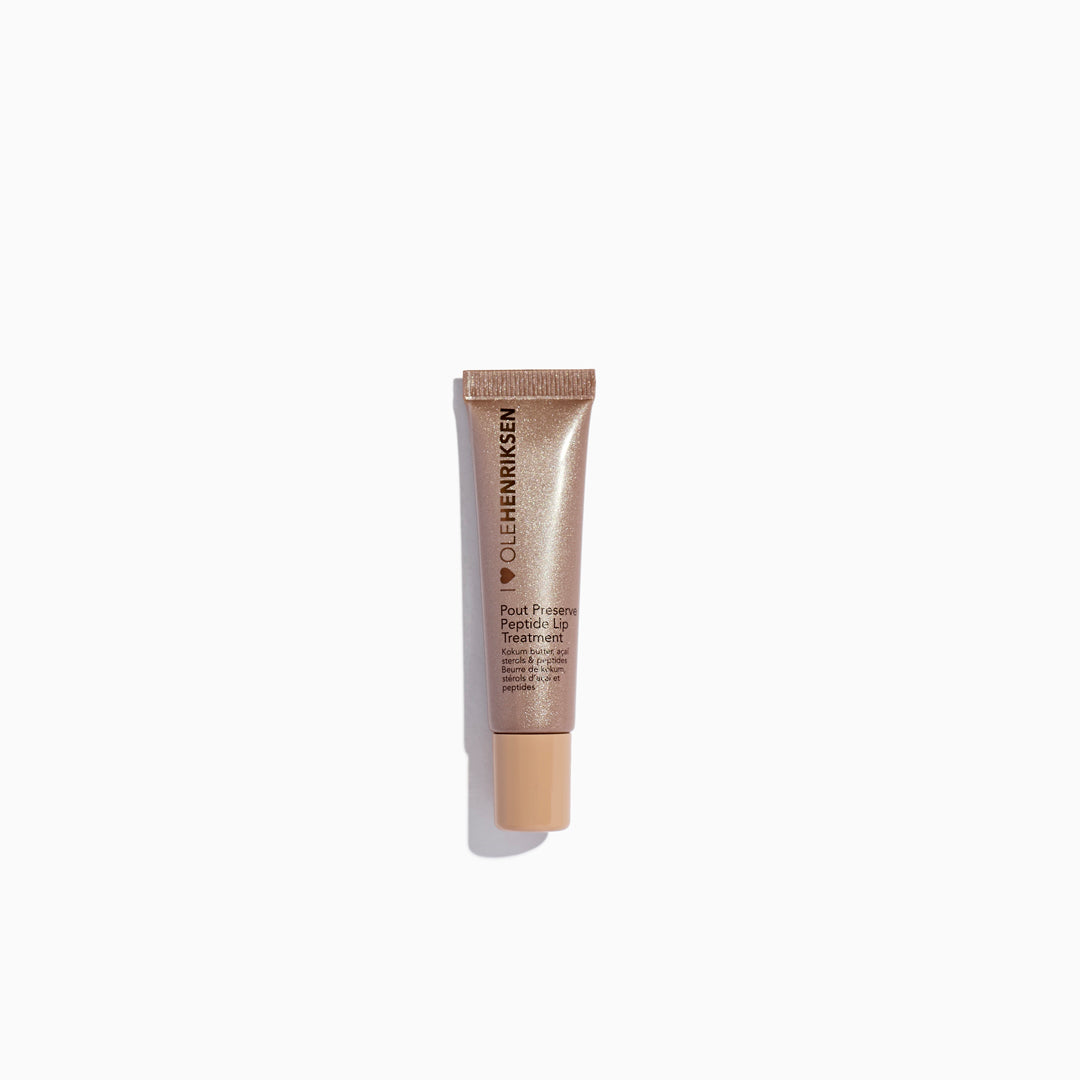 OLE HENRIKSEN POUT PRESERVE PEPTIDE LIP TREATMENT - CRÈME BRÛLÉE GLIMMER